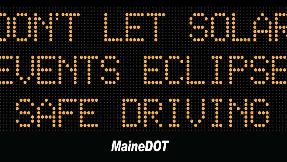 Highway sign uses eclipse to warn against distracted driving