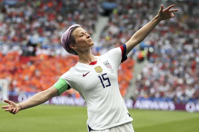 In&#x20;this&#x20;July&#x20;7,&#x20;2019&#x20;file&#x20;photo,&#x20;Megan&#x20;Rapinoe&#x20;celebrates&#x20;after&#x20;scoring&#x20;the&#x20;opening&#x20;goal&#x20;from&#x20;the&#x20;penalty&#x20;spot&#x20;during&#x20;the&#x20;Women&#x27;s&#x20;World&#x20;Cup&#x20;final&#x20;soccer&#x20;match&#x20;against&#x20;The&#x20;Netherlands&#x20;at&#x20;the&#x20;Stade&#x20;de&#x20;Lyon&#x20;in&#x20;Decines,&#x20;outside&#x20;Lyon,&#x20;France.
