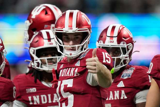 Indiana quarterback Fernando Mendoza (15) reacts during the second half of the Peach Bowl NCAA college football playoff semifinal against Oregon, Friday, Jan. 9, 2026, in Atlanta.