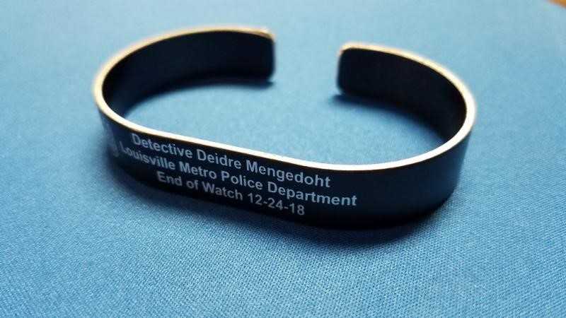 Memorial bracelets benefiting Det. Mengedoht's family now on sale