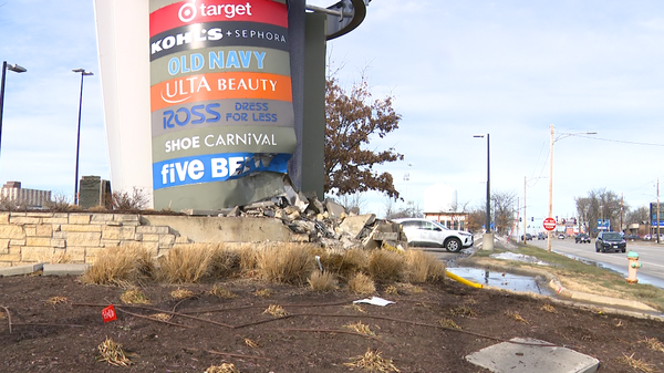 vehicle crashes into merle hay mall sign in des moines