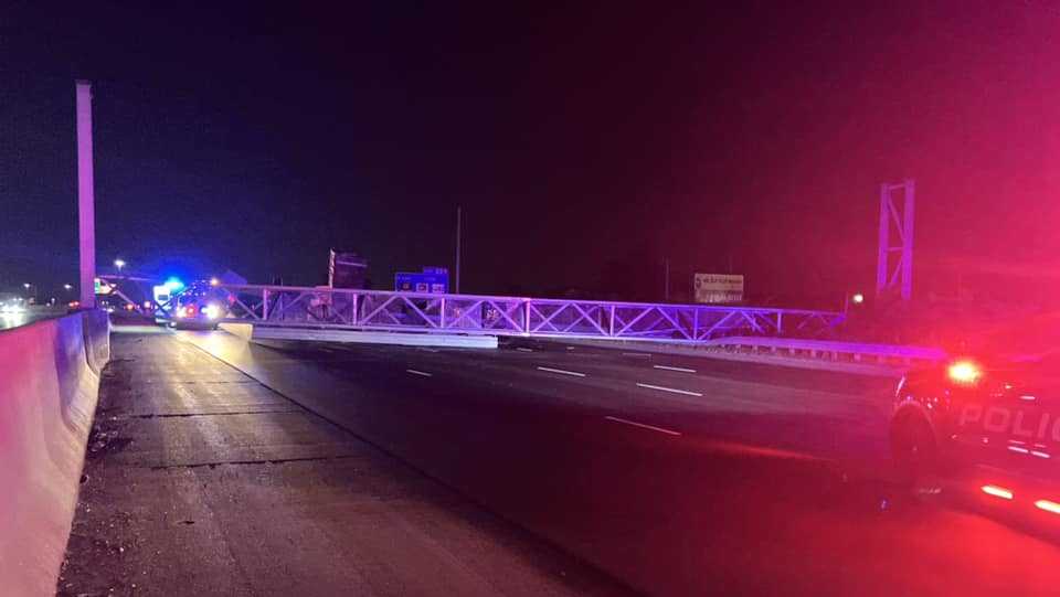 Crash Sends Traffic Sign Falling Onto Interstate 35