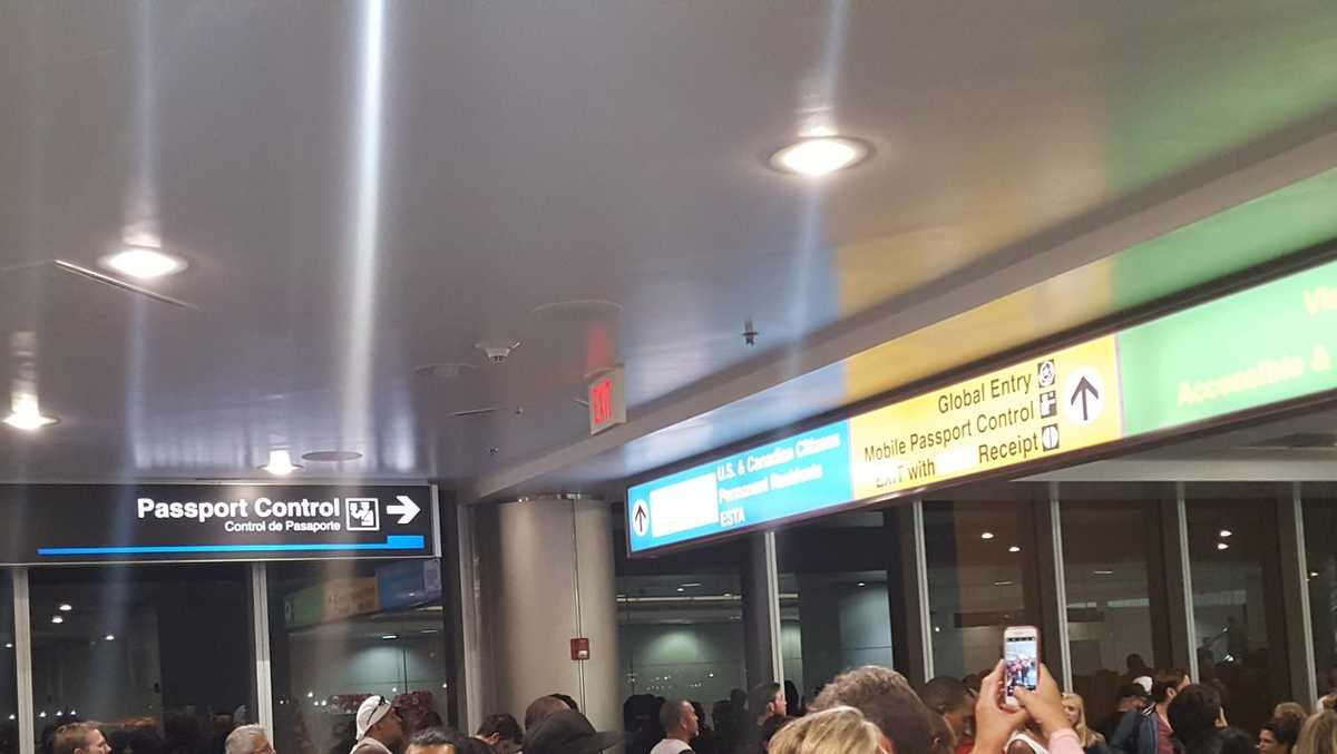 Nationwide customs computer outage creates chaotic scene at airports