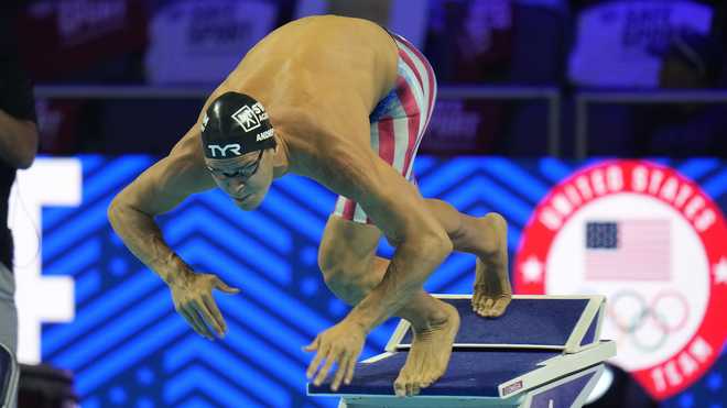 In&#x20;this&#x20;June&#x20;19,&#x20;2021,&#x20;file&#x20;photo,&#x20;Michael&#x20;Andrew&#x20;participates&#x20;in&#x20;the&#x20;men&#x27;s&#x20;50&#x20;freestyle&#x20;during&#x20;wave&#x20;2&#x20;of&#x20;the&#x20;U.S.&#x20;Olympic&#x20;Swim&#x20;Trials&#x20;in&#x20;Omaha,&#x20;Neb.