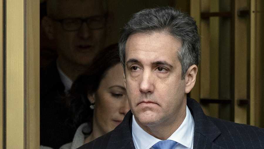 Michael Cohen, President Donald Trump's former lawyer, leaves federal court after his sentencing in New York, Wednesday, Dec. 12, 2018.