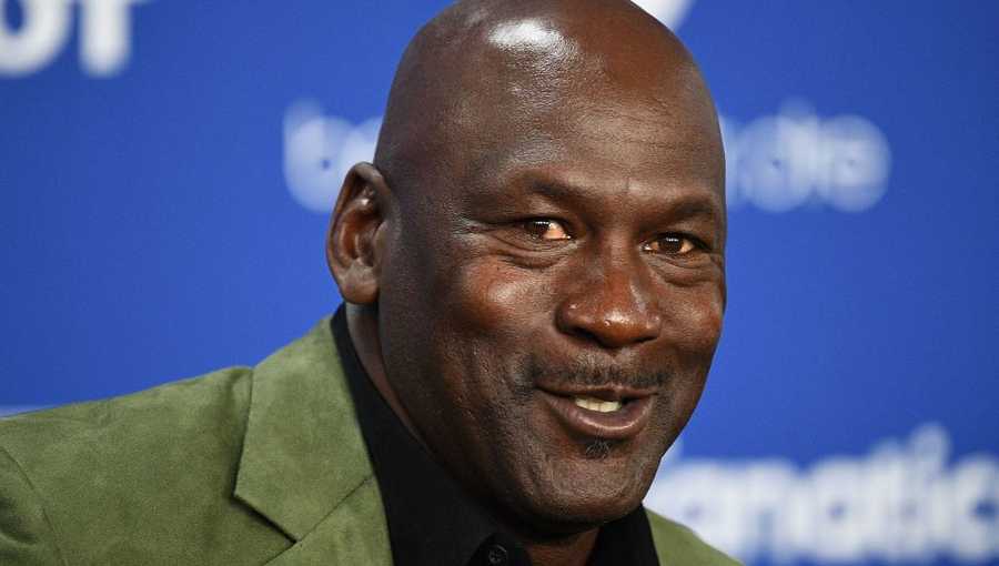 Former NBA star and owner of Charlotte Hornets team Michael Jordan looks on as he addresses a press conference ahead of the NBA basketball match between Milwaukee Bucks and Charlotte Hornets at The AccorHotels Arena in Paris on Jan. 24, 2020.