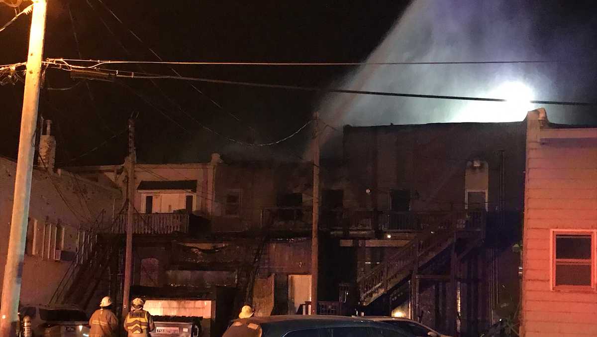 'Get out, the building's on fire' Building fire forces people to