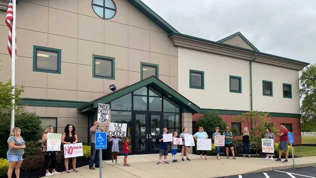 Demonstrators gather at Lakota School building one day after mask requirement announced - Vimarsana News