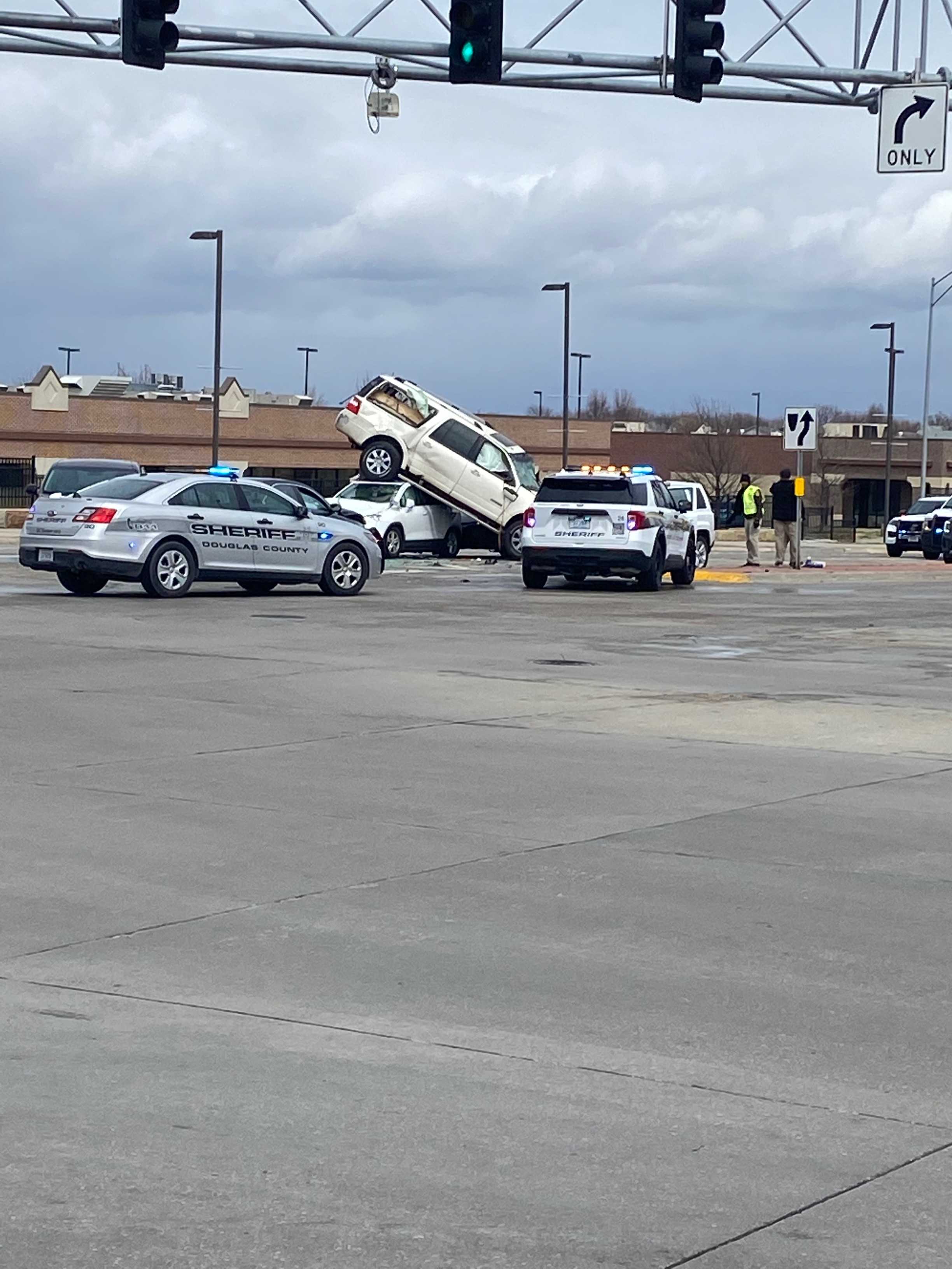 Four-car Accident In West Omaha Sees One Car On Top Of Another