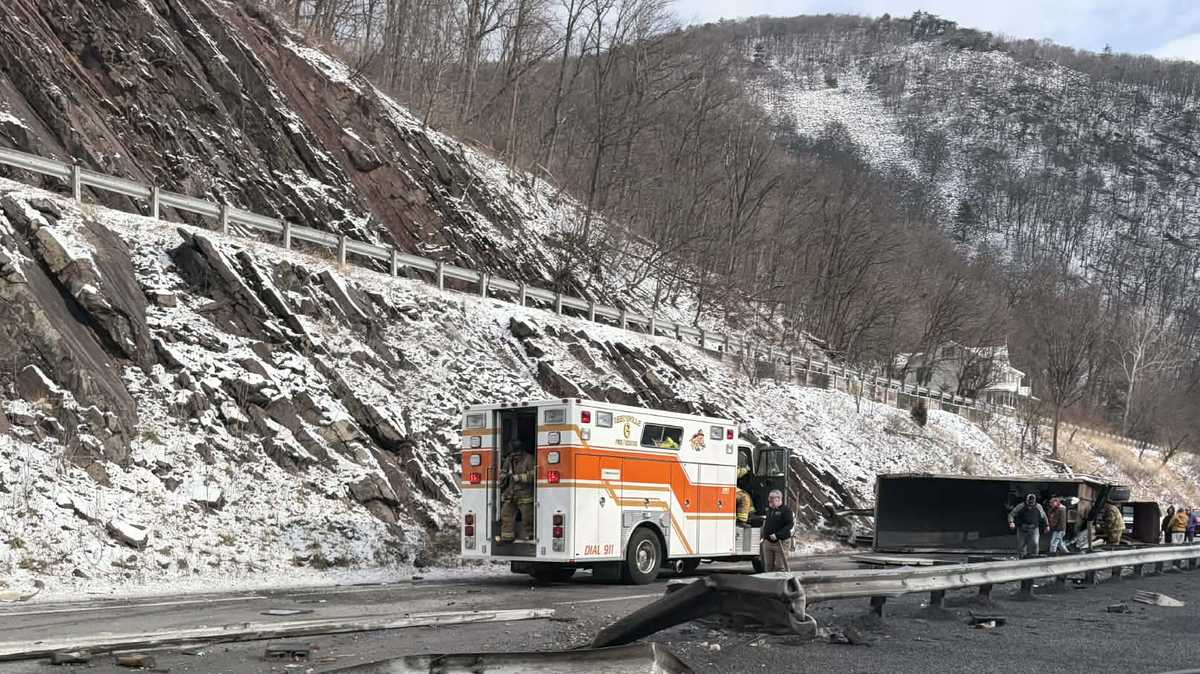 Dump truck crashes through guardrails, flips over on Mifflin County road