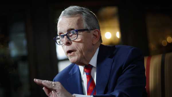 FILE - In this Dec. 13, 2019, file photo, Ohio Gov. Mike DeWine speaks during an interview at the Governor's Residence in Columbus, Ohio. (AP Photo/John Minchillo, File)