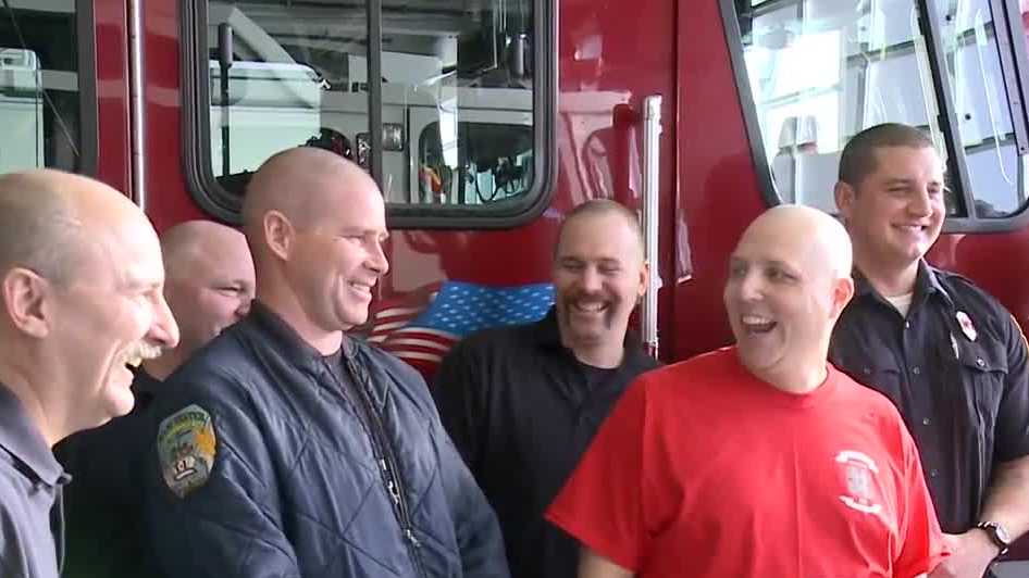 Firefighters cut hair, raise money for colleague with cancer
