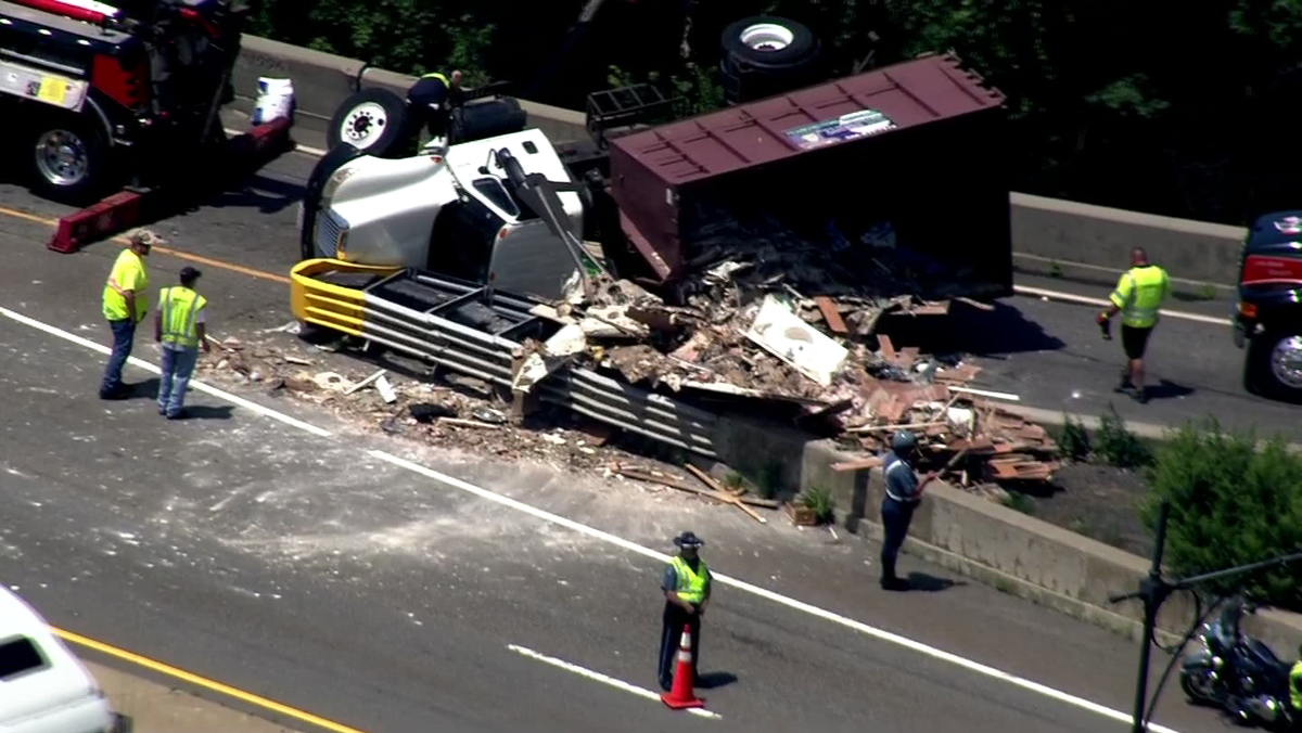 Truck rolls, spills debris on ramp in Millbury