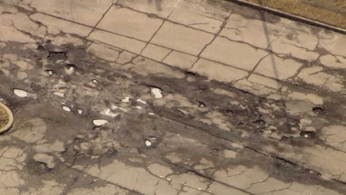 Pittsburgh Mills mall road riddled with large potholes Pittsburgh Mills mall road riddled with large potholes