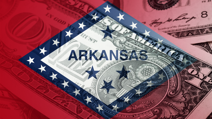 FILE image of the Arkansas State Flag superimposed over dollar bills