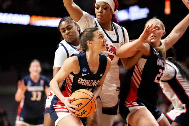 Gonzaga guard Allie Turner (11) drives towards the basket against Mississippi during the second half in the first round of the NCAA college basketball tournament, Friday, March 20, 2026, in Minneapolis, Minn.