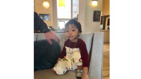 Kansas City police say toddler found wandering near hotel has been reunited with family