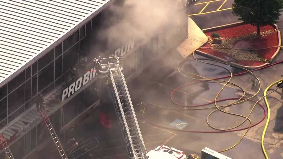 SKY 4 VIDEO Firefighters battle flames, heavy smoke at Pro Bike and