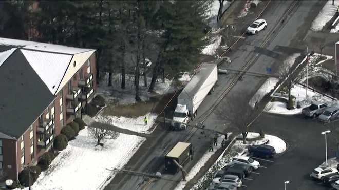 Tractor Trailer Pulls Down Several Utility Poles On Stoneham Massachusetts Street