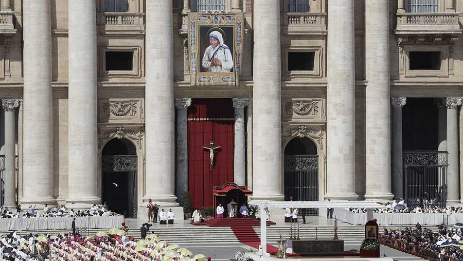 A tapestry depicting Mother Teresa hangs from the balcony of St. Peter's Basilica as Pope Francis celebrates a Canonization Mass at the Vatican on Sunday.