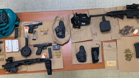 Police seize guns while executing search warrant