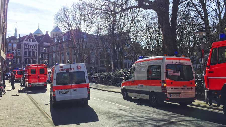 Ambulances stand in downtown Muenster, Germany, Saturday, April 7, 2018.