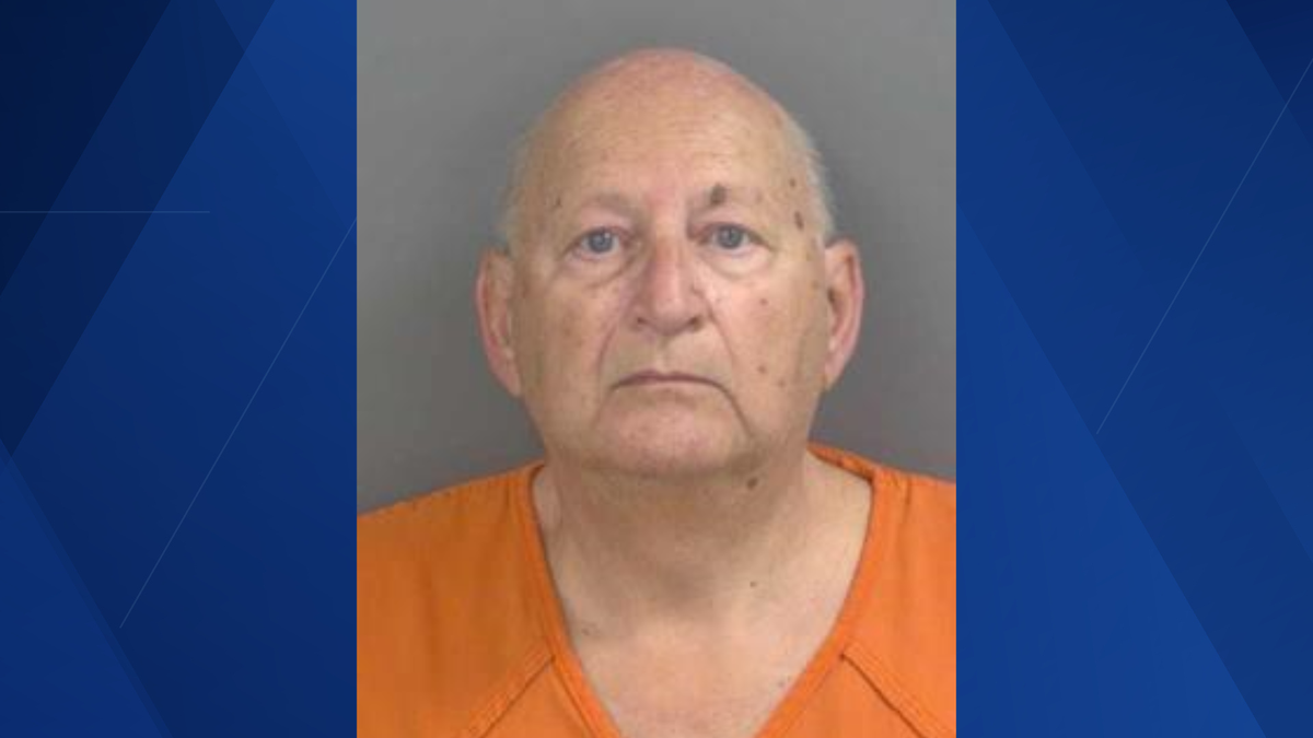 Driver arrested for pointing firearm during road rage incident in ...