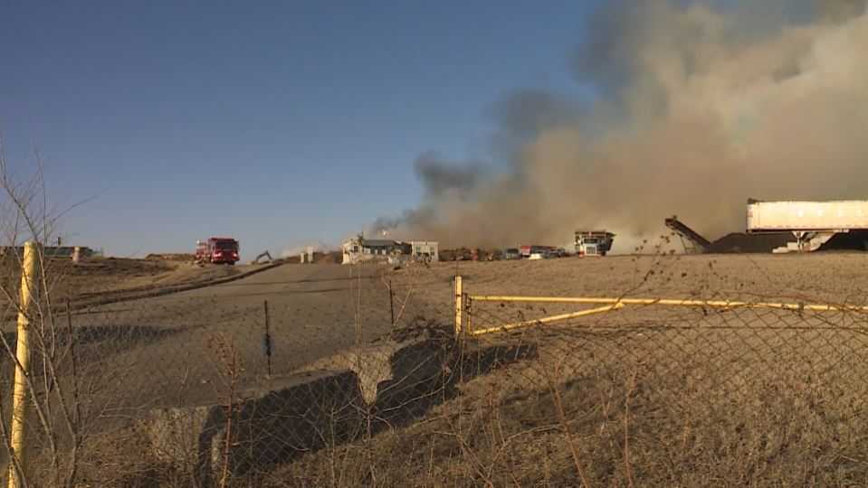 KC firefighters battle large mulch fire off U.S. 40