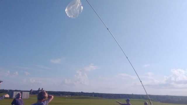 Local operator explains why he believes downed object may be Illinois club's radio balloon