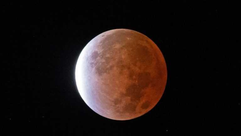 A total lunar eclipse occurs when Earth casts a complete shadow – called an umbra – over the Moon.