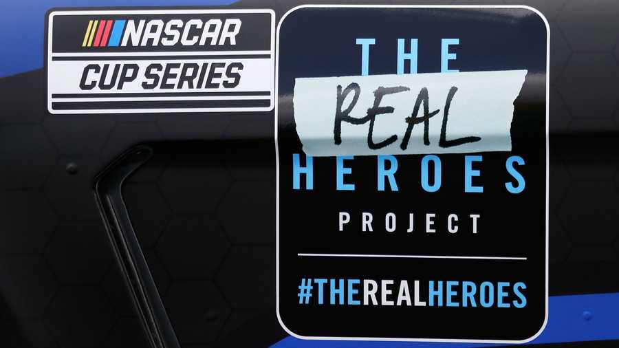 a decal bearing the name of the real heroes 400 nascar cup series auto race is displayed on the car of driver chris buescher sunday, may 17, 2020, in darlington, south carolina
