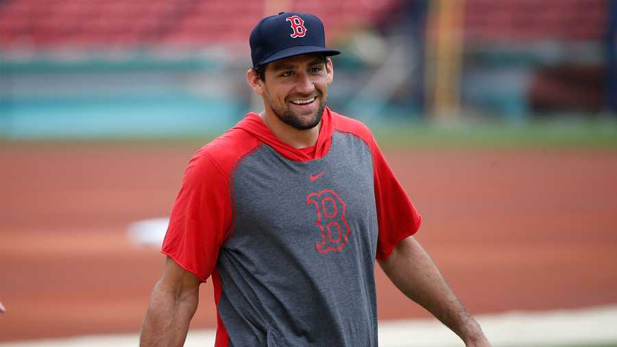 Nathan Eovaldi walks on the field during baseball practice at Fenway Park in Boston, Friday, July 3, 2020. (AP Photo/Michael Dwyer)