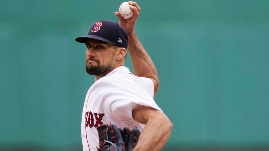 Boston Red Sox starting pitcher Nathan Eovaldi delivers In the first inning of a baseball game against the Tampa Bay Rays at Fenway Park, Wednesday, April 7, 2021, in Boston. (AP Photo)