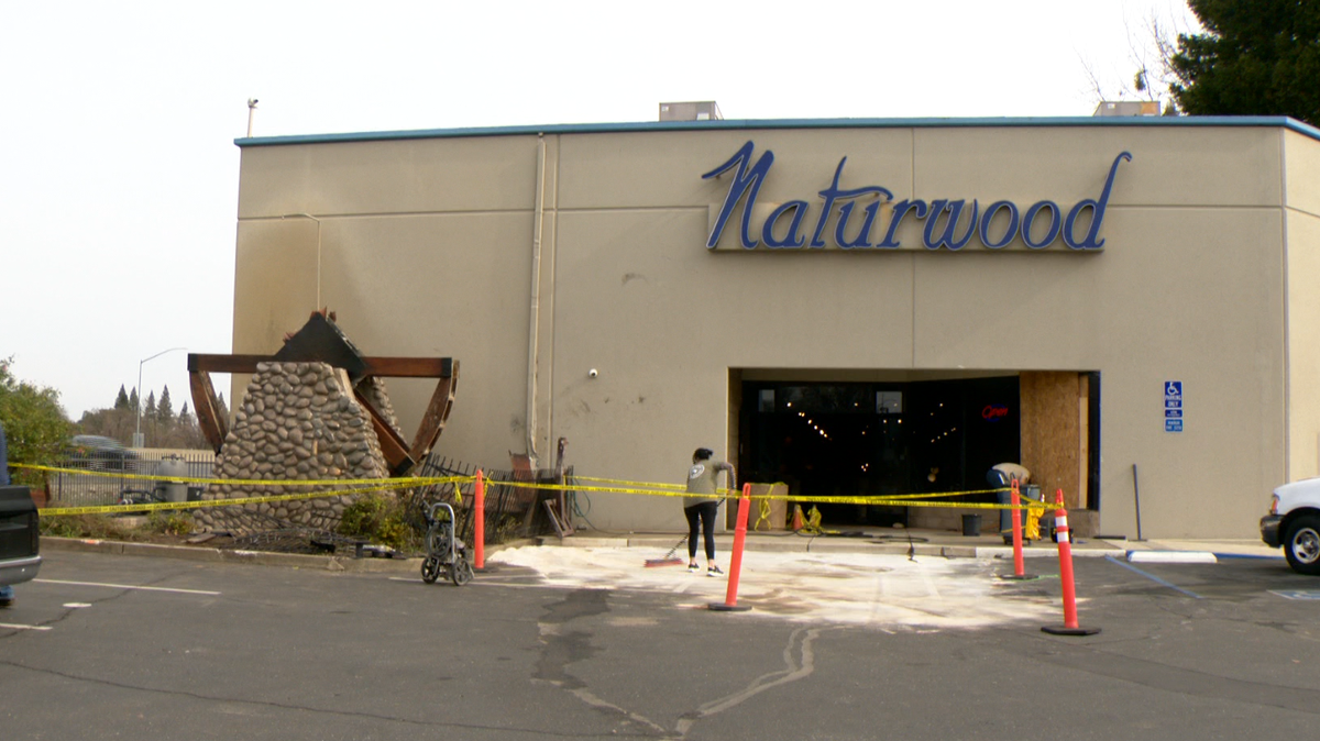 Watch: Driver veers off California highway, crashes into water wheel