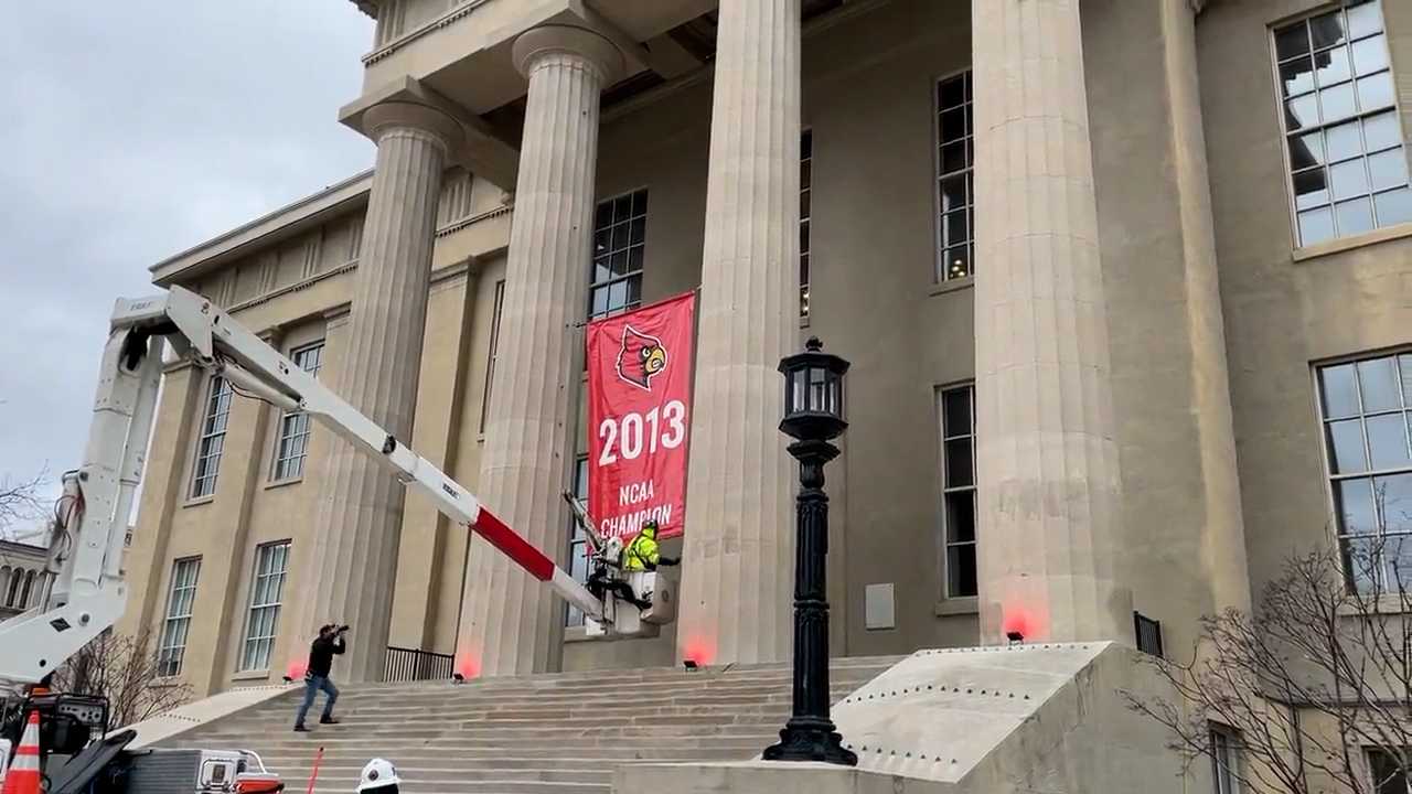 UofL basketball 2013 National Championship banner hung up in front of Metro Hall picture