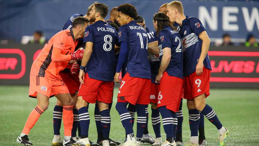New England Revolution huddle up prior to the start of an MLS soccer match against the Montreal Impact, Friday, Nov. 20, 2020, in Foxborough, Mass. (AP Photo/Stew Milne)