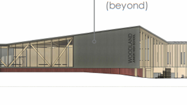 Fayetteville approves site for new school, preserving historic barns