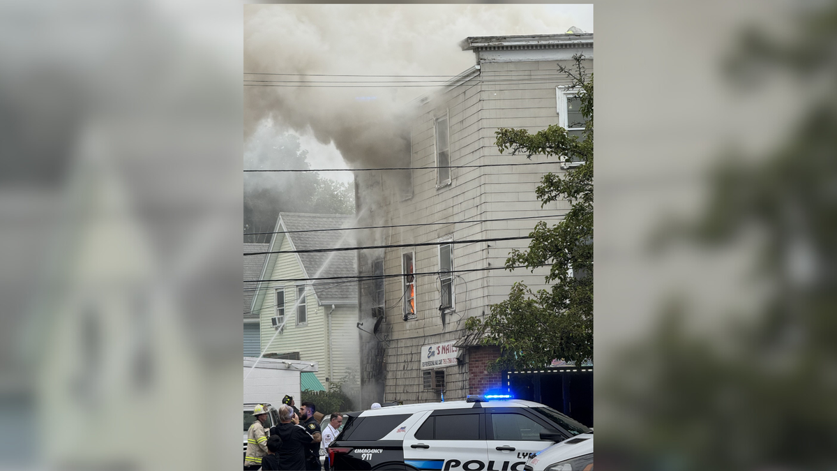 10 people displaced, 2 firefighters injured after house fire in Lynn, Mass.