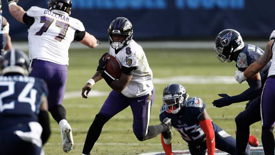 Baltimore Ravens quarterback Lamar Jackson (8) scrambles against the Tennessee Titans in the second half of an NFL wild-card playoff football game Sunday, Jan. 10, 2021, in Nashville, Tenn.