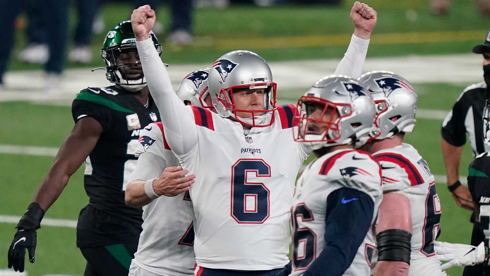 The throwback New England Patriots logo appears on the center of the field  before the start of NFL football game against the Detroit Lions, Sunday,  Oct. 9, 2022, in Foxborough, Mass. (AP