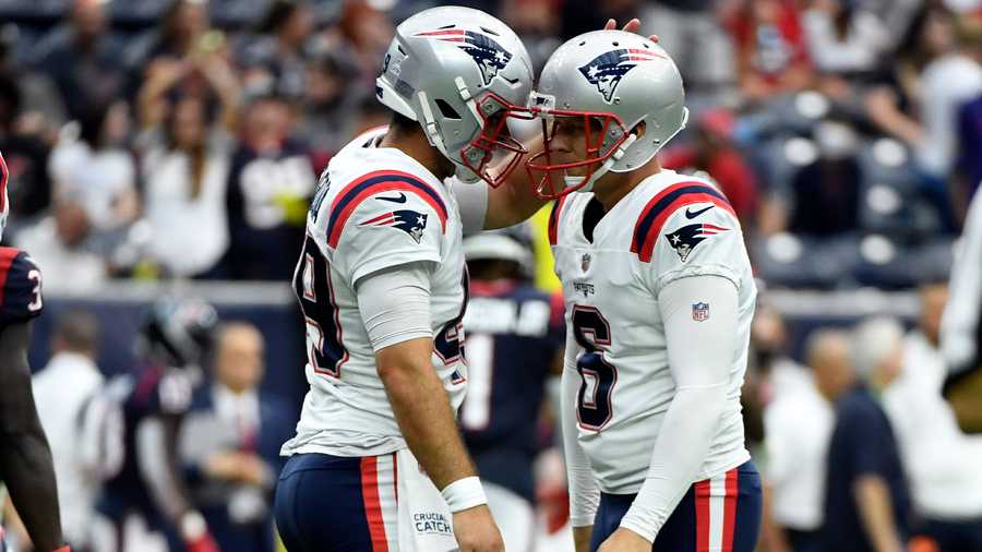 New England Patriots place kicker Nick Folk (6) celebrates with long snapper Joe Cardona after kicking a game-winning field goal against the Houston Texans during the second half of an NFL football game Sunday, Oct. 10, 2021, in Houston. The Patriots won 25-22. (AP Photo)