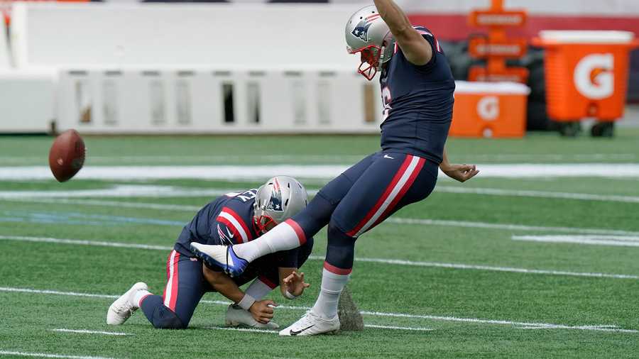 New England Patriots kicker Nick Folk, right, warms up before an NFL football game against the Miami Dolphins, Sunday, Sept. 13, 2020, in Foxborough, Mass. (AP Photo/Steven Senne)
