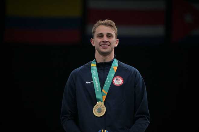 US&amp;apos&#x3B;&#x20;Nick&#x20;Itkin&#x20;poses&#x20;with&#x20;the&#x20;gold&#x20;medal&#x20;during&#x20;the&#x20;podium&#x20;ceremony&#x20;of&#x20;the&#x20;men&amp;apos&#x3B;s&#x20;foil&#x20;individual&#x20;fencing&#x20;event&#x20;of&#x20;the&#x20;Pan&#x20;American&#x20;Games&#x20;Santiago&#x20;2023&#x20;at&#x20;the&#x20;Paralympic&#x20;Sports&#x20;Centre&#x20;in&#x20;the&#x20;National&#x20;Stadium&#x20;Sports&#x20;Park&#x20;in&#x20;Santiago&#x20;on&#x20;October&#x20;31,&#x20;2023.&#x20;&#x28;Photo&#x20;by&#x20;ERNESTO&#x20;BENAVIDES&#x20;&#x2F;&#x20;AFP&#x29;&#x20;&#x28;Photo&#x20;by&#x20;ERNESTO&#x20;BENAVIDES&#x2F;AFP&#x20;via&#x20;Getty&#x20;Images&#x29;