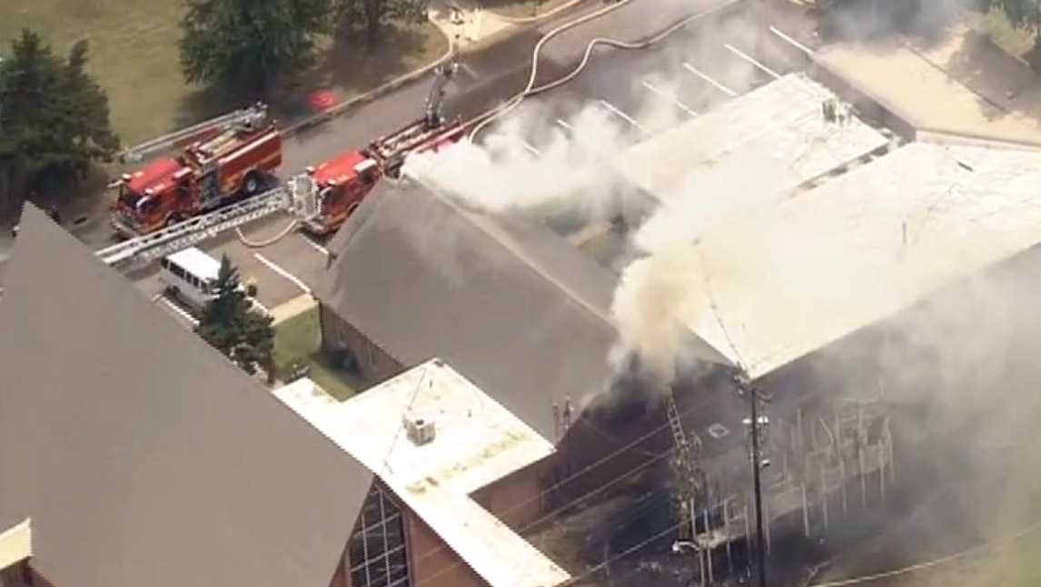 Crews battle fire at Norman church