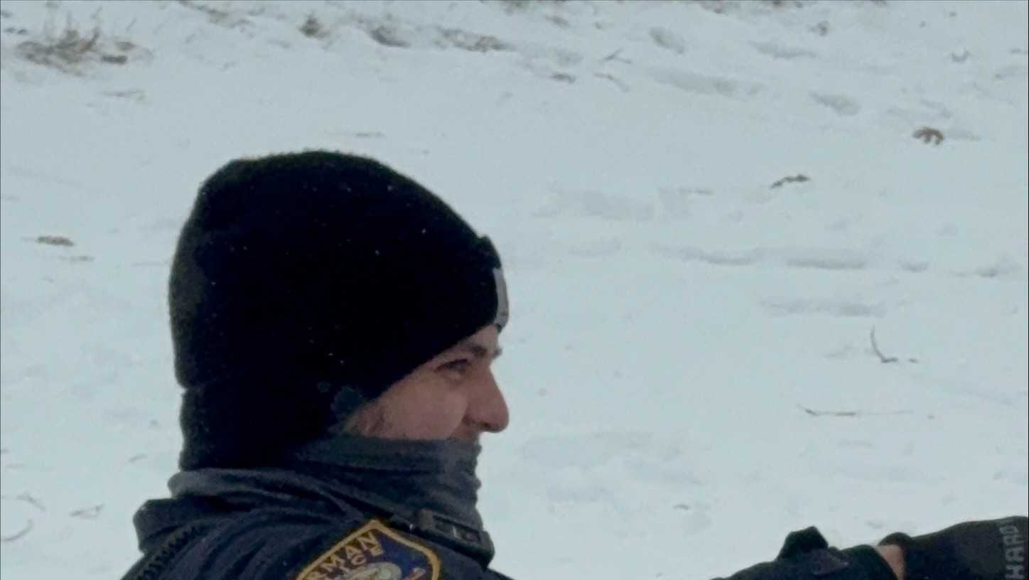 Police officers join Norman children for snow day fun