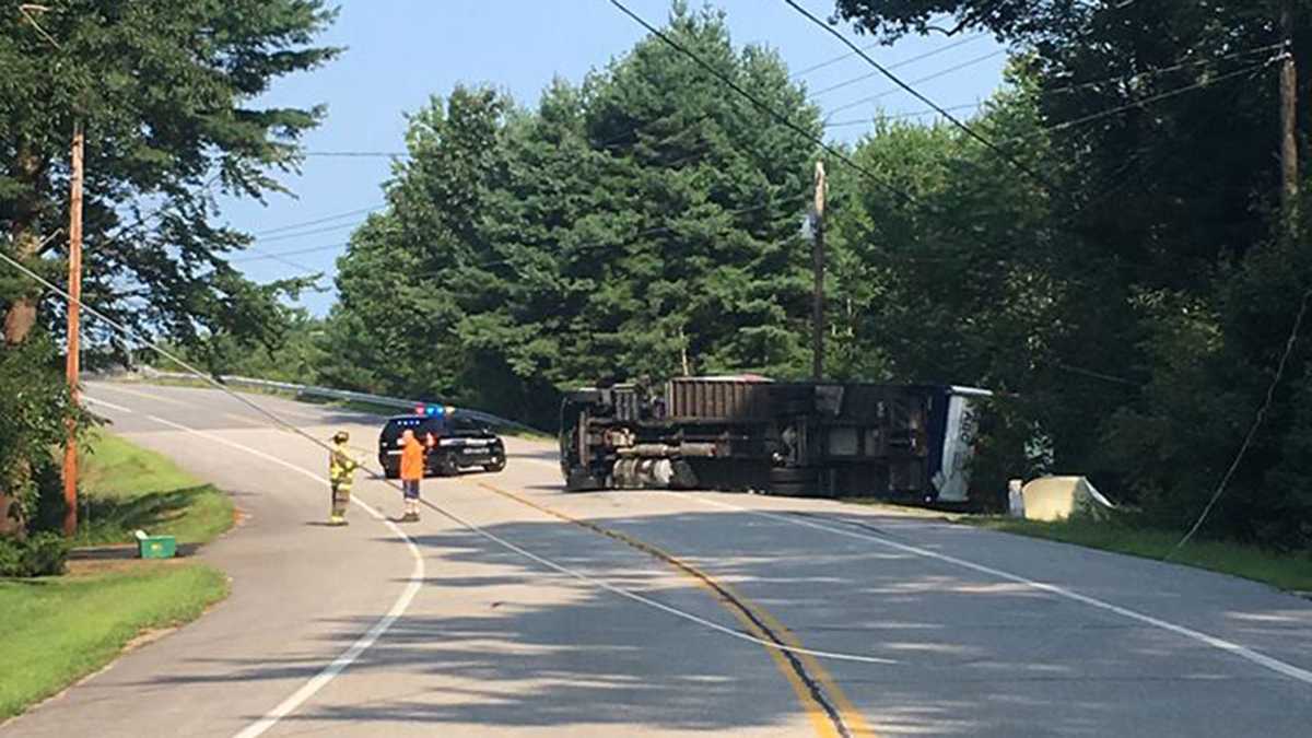 Portion of busy North Hampton road closed after truck rolls over