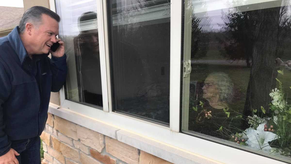 Touching video shows Butler County man visiting mom through window of her nursing home
