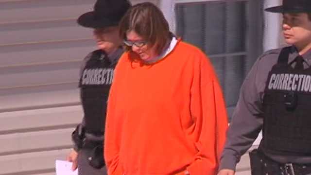 Couple accused of killing adopted son before fire