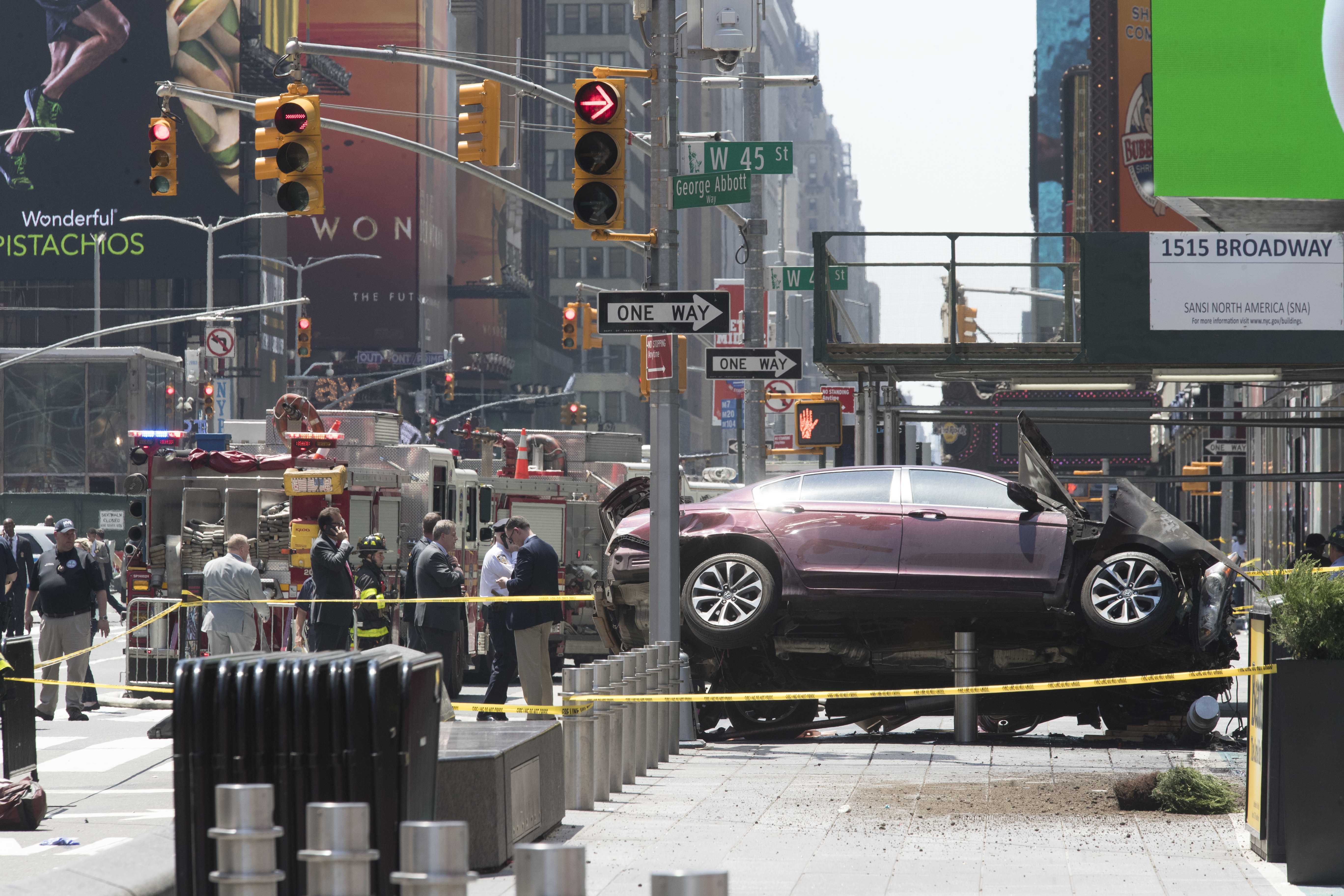 At least 1 dead, driver in custody after car plows into Times Square ...