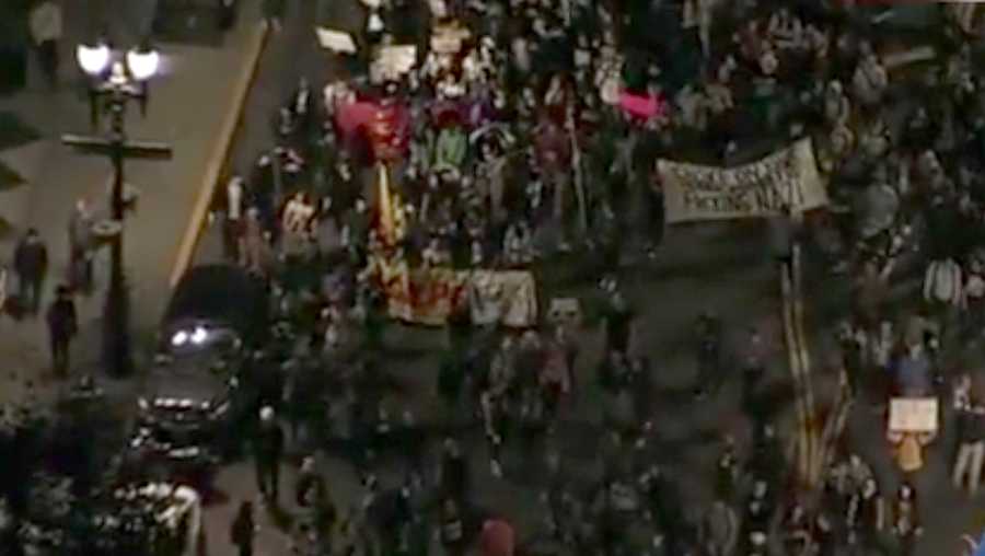 People marched through Oakland on Wednesday, Nov. 9, 2016, to protest President-elect Donald Trump.